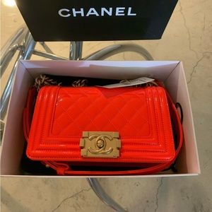 Authentic Chanel neon orange patent leather small boy